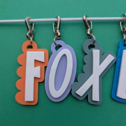 Acrylic layered initial bag tag - scalloped or smooth