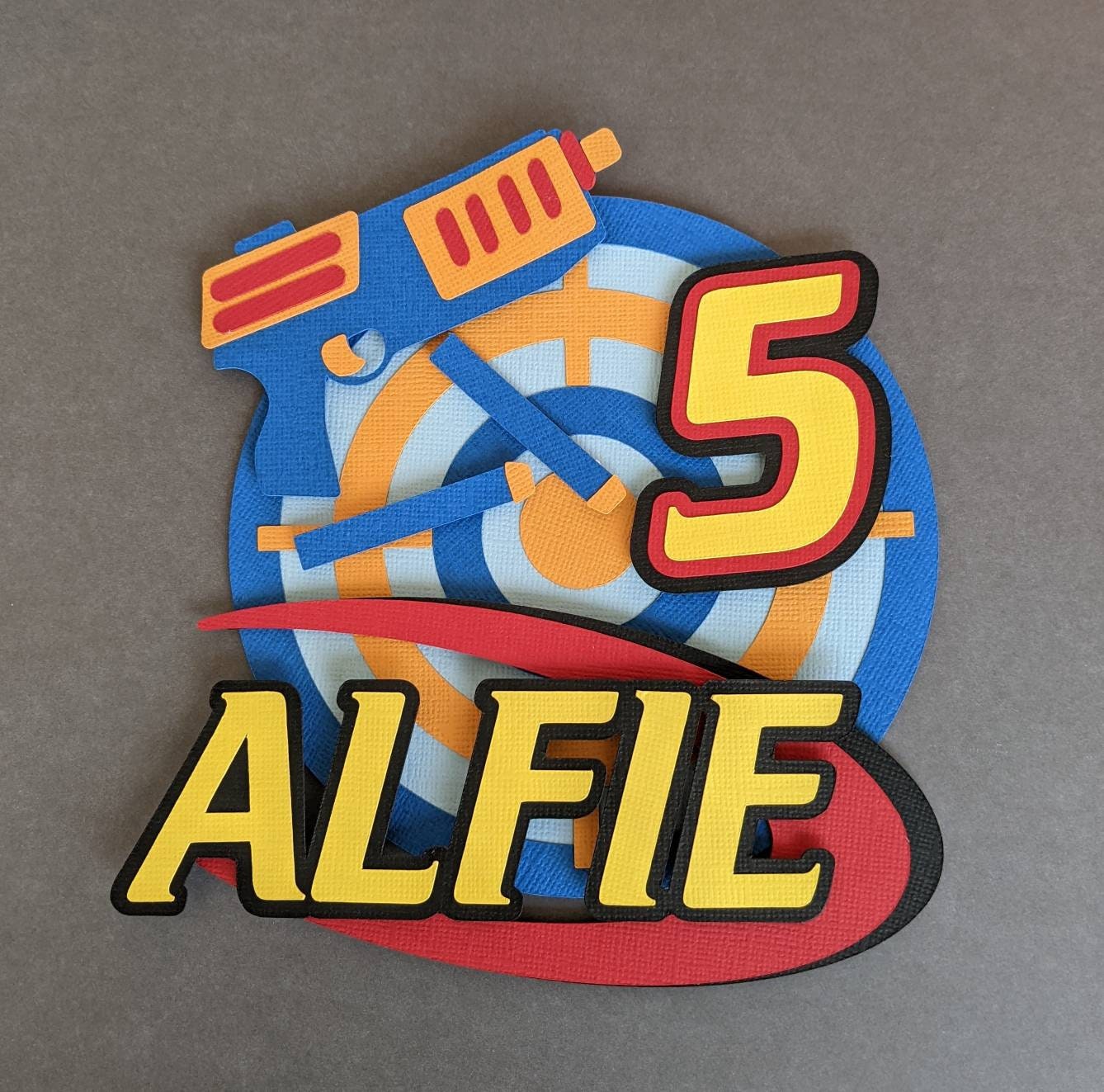 Personalised shooter target cake topper