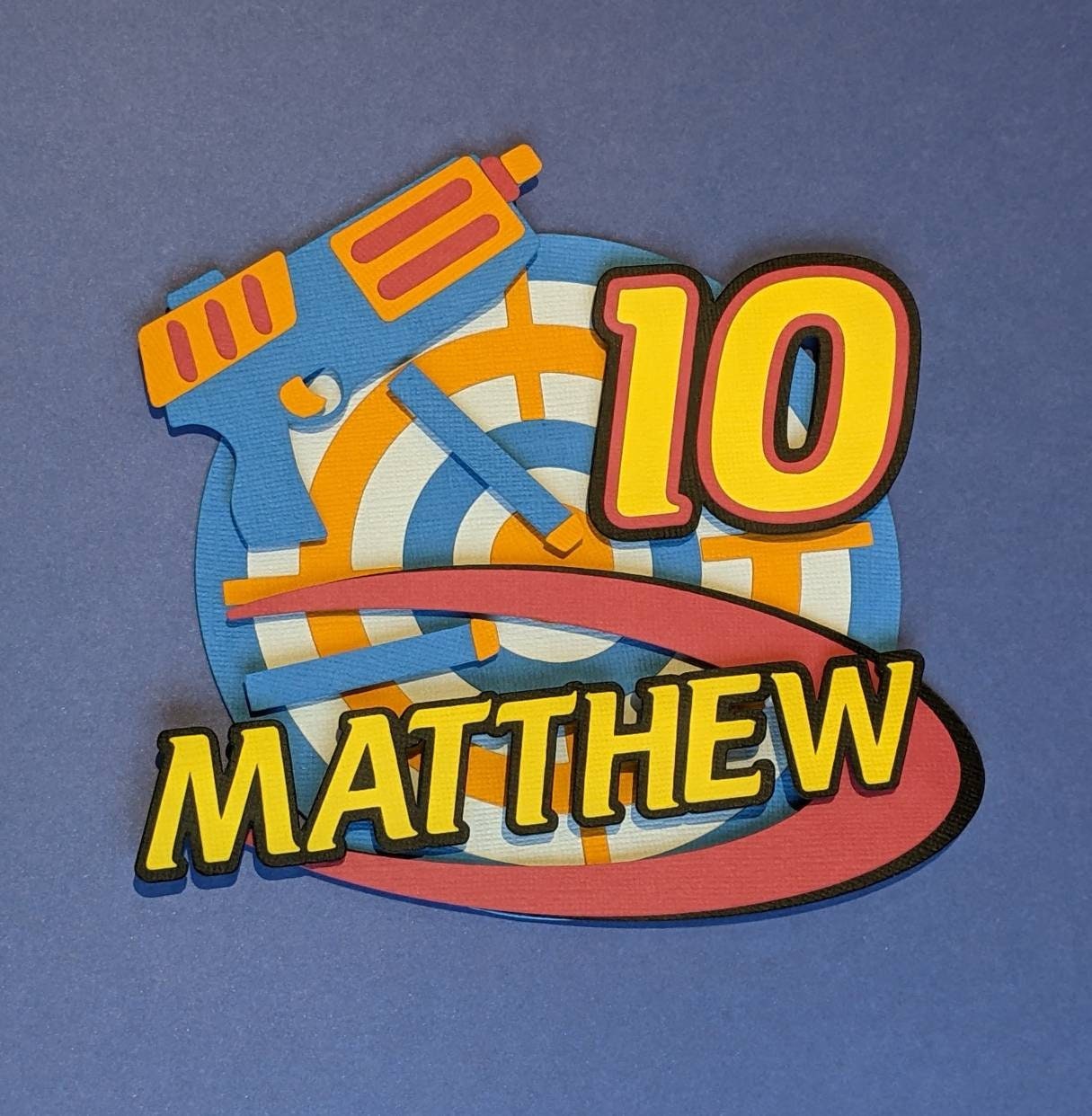 Personalised shooter target cake topper