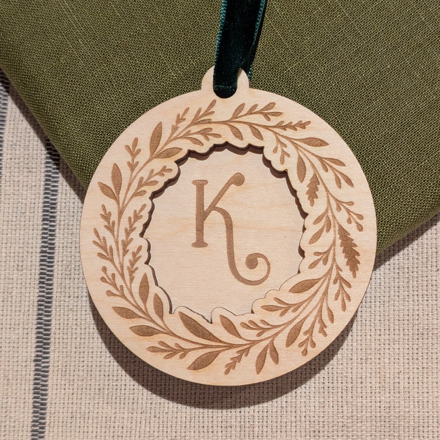 Initial pine wreath engraved wooden Christmas ornament